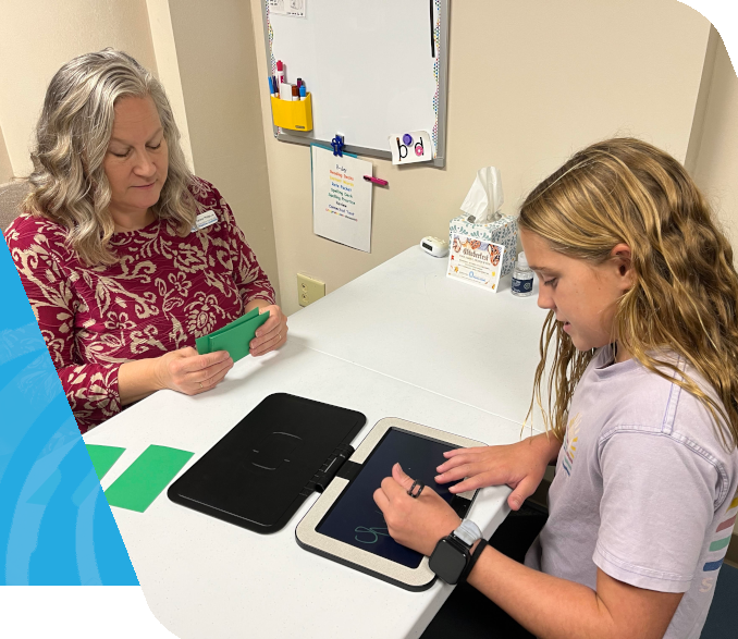 Tutoring with Tablet Image of 1 on 1 tutoring